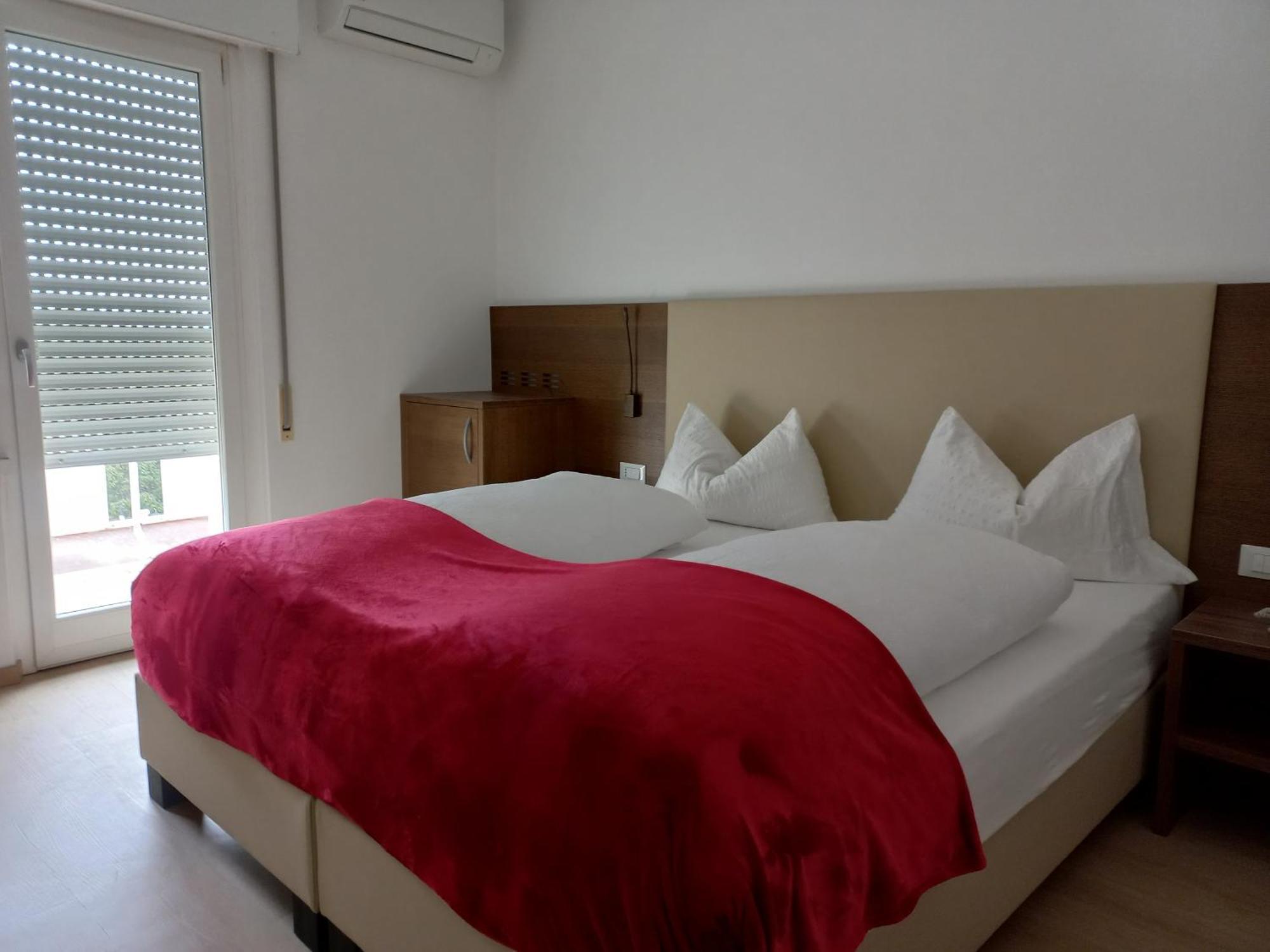 Hotel Lux Merano Quarto foto